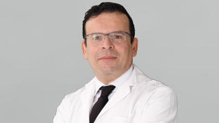 Dr. Kamal Larbi